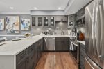 Luxurious kitchen styled with a marble countertop 